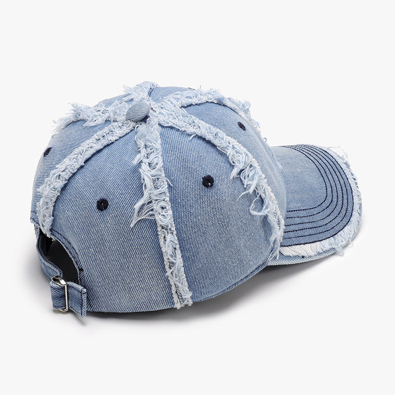 Gorra de béisbol de algodón en denim azul con detalles desgastados y ajuste trasero