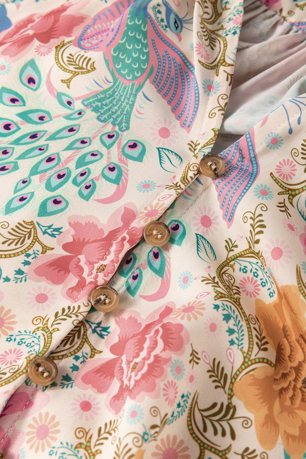 Vestido estampado elegante de Trendsi con botones decorativos y diseño floral colorido