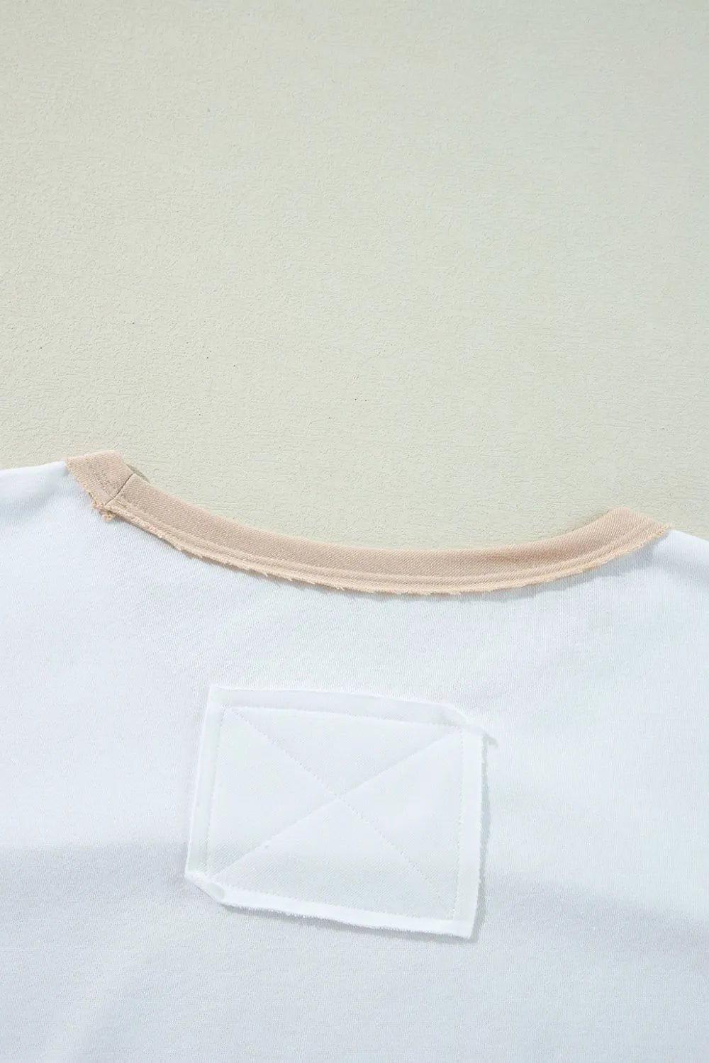 Camiseta túnica mujer de Trendsi con un diseño de cuello redondo en color blanco