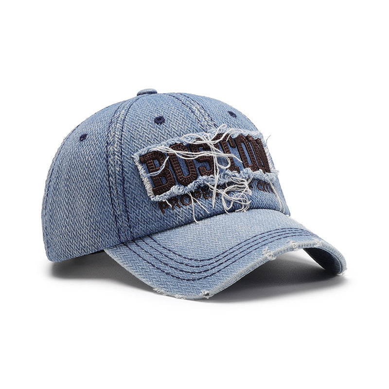 Gorra casual de estilo urbano en denim con diseño desgastado y bordado distintivo