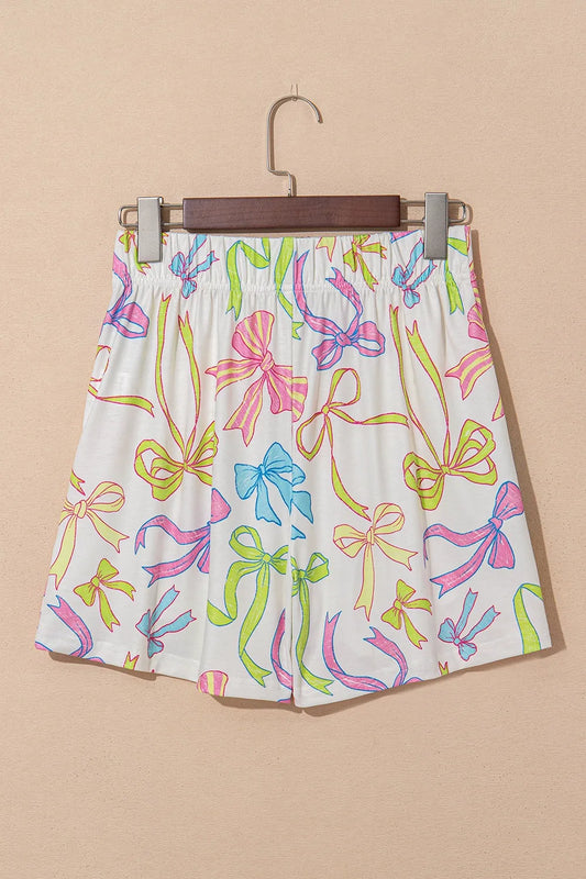Pantalones cortos casuales colores con diseño de lazos en tonos pastel, ideal para el verano